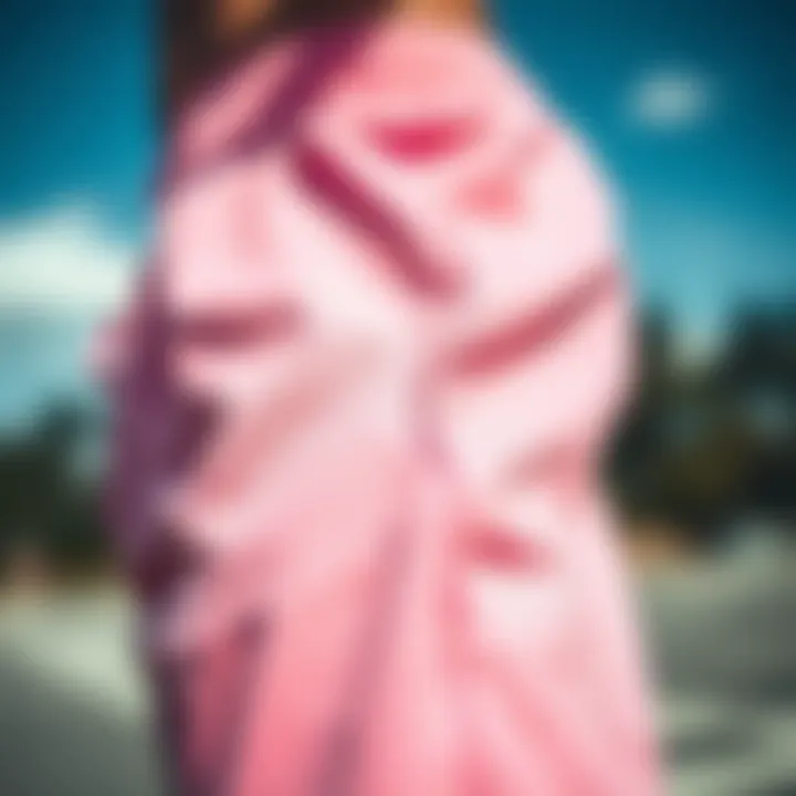 Close-up of fabric texture and details of pink sweat shorts