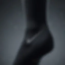 Close-up of black Nike socks with branding