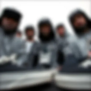 Group of skateboarders wearing black and white Vans