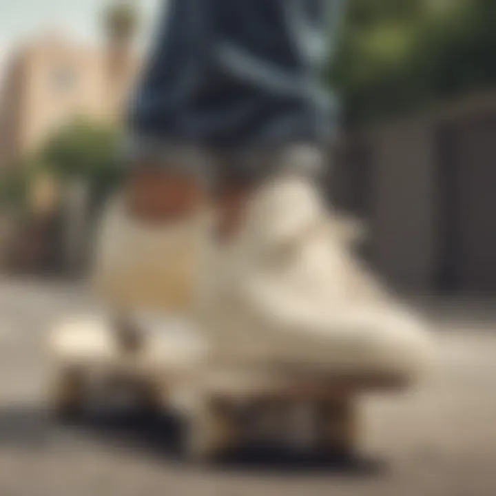 Stylish cream Adidas sneakers on a skateboard