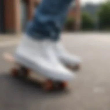 Close-up of durable white vans with skateboard wear