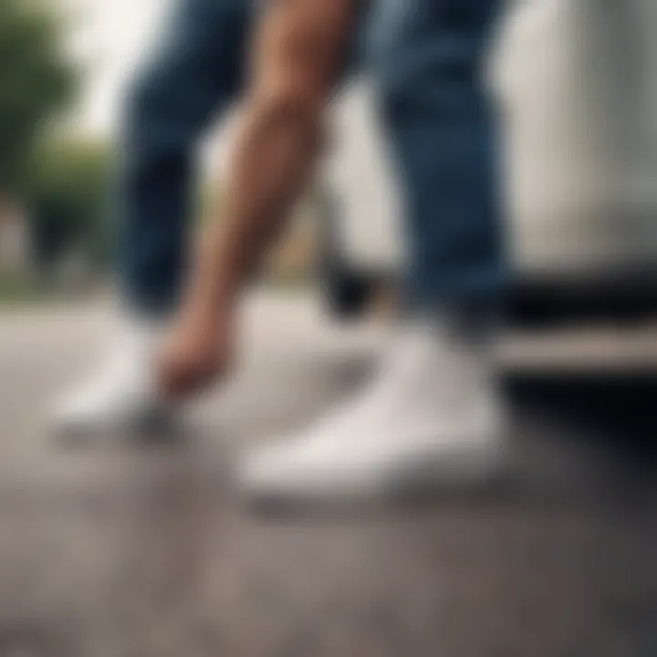 Skater maintaining their white vans after a session