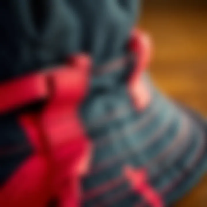 Craftsmanship and Material Choices Close-up of the fabric of a black and red bucket hat, highlighting texture and craftsmanship.