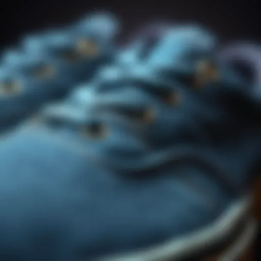 Detail of Denim Blue Vans A close-up of denim blue Vans showcasing intricate stitching and fabric texture