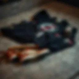 Grunge aesthetic clothing laid out on a textured surface