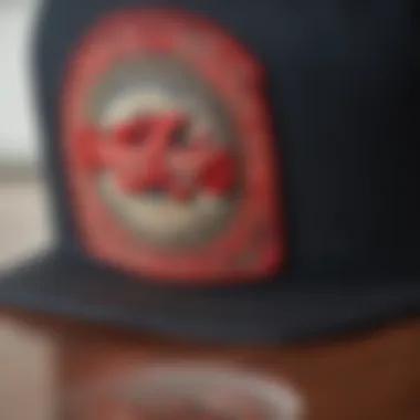 Close-up of the intricate stitching and embroidery on a Mitchell and Ness snapback