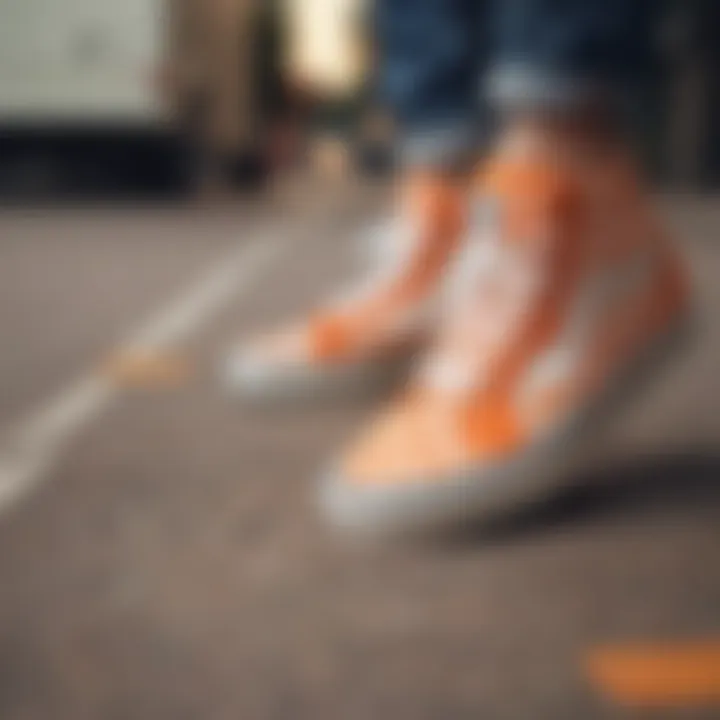 Fashionable outfit paired with orange checkerboard Vans.