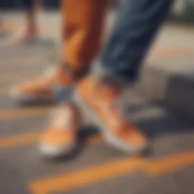 Group of friends wearing orange checkerboard Vans at a skate park.