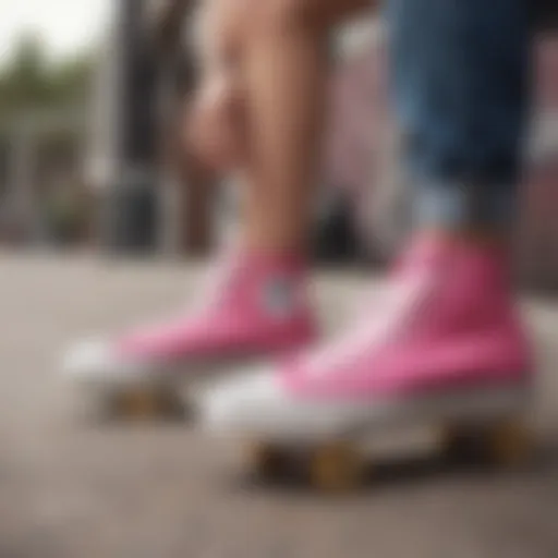 Vibrant pink Converse shoes on a skateboard