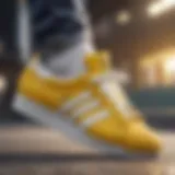 A close-up view of yellow and white shell toe Adidas shoes highlighting their iconic design.