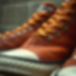 Close-up of tan leather Converse showcasing intricate stitching and texture