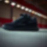 Close-up view of the Reebok all black skate shoe showcasing its sleek design.