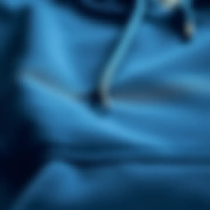 Fabric and Stitching Details of the Blue Backwoods Hoodie Close-up of the fabric and stitching details of the blue backwoods hoodie