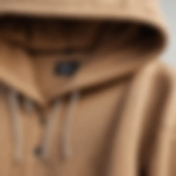 Close-up of the fabric texture of the tan hoodie