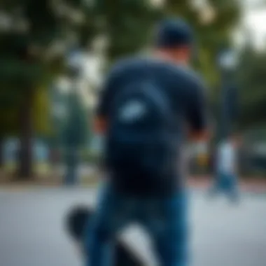Skateboarder with Small Nike Backpack Skateboarder using the small Nike backpack in a park