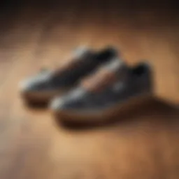 A close-up of a pair of stylish clearance skateboard shoes on a wooden surface.