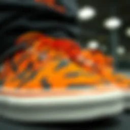 Close-up of orange camouflage Vans showcasing unique design patterns