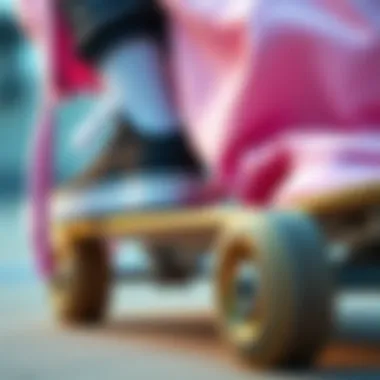Fashion Meets Functionality in Skateboarding Close-up of skateboard wheels and a pastel pink hoodie draped over a board, illustrating the blend of fashion and functionality.