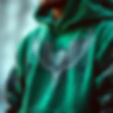 Artistic Designs of the Green Hoodie Close-up of intricate graphic designs on a green hoodie, showcasing artistic expression