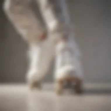 A skater performing tricks while wearing stylish white leather skate shoes