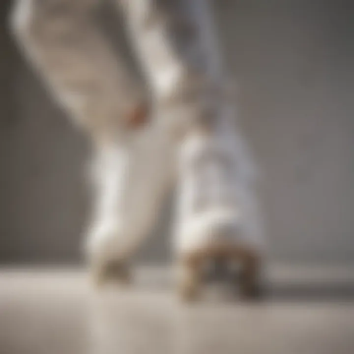 A skater performing tricks while wearing stylish white leather skate shoes