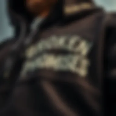 Detailing of the Hoodie Close-up of the Broken Promises hoodie fabric and design details