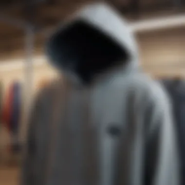 Fabric Texture of Long Sleeve Hoodie Shirts A stylish long sleeve hoodie shirt hanging on a rack showcasing fabric texture.