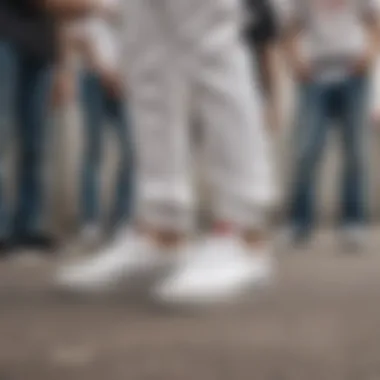 Group of skateboarders wearing various styles of white Vans belts