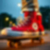 A close-up of red hi-top Chucks on a skateboard